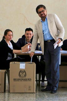 Ivan Marquez of the political party of the FARC casts his vote during the legislative elections in Bogota, Colombia March 11, 2018.