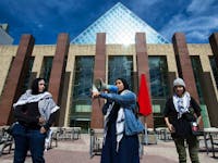  Protesters rally outside City Hall to protest the Edmonton Police Service’s (EPS) recent removal of a pro-Palestinian protest camp at the University of Alberta, in Edmonton Tuesday May 14, 2024. The EPS was presenting their annual report to Edmonton City Council Tuesday.
