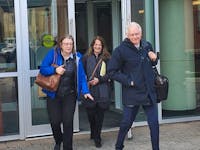 Mary Ann Holland, left, Michelle Morrison, centre, and lawyer Barry Morrison are seen leaving the Saint John Law Courts in April 2023. Holland's lawsuit against four Wolastoquey First Nations and their chiefs over eel harvesting survived a court ruling May 7.