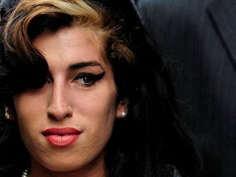 British singer Amy Winehouse arrives at Westminster Magistrates Court in central London July 23, 2009.