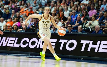 May 14, 2024; Uncasville, Connecticut, USA; Indiana Fever guard Caitlin Clark (22) returns the ball against the Connecticut Sun in the first quarter at Mohegan Sun Arena. Mandatory Credit: David Butler II-USA TODAY Sports