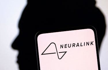 Neuralink logo and Elon Musk silhouette are seen in this illustration taken, December 19, 2022.