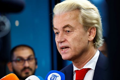 Dutch far-right politician and leader of the PVV party Geert Wilders reacts as he meets the press as Dutch parties' lead candidates meet for the first time after elections, in which far-right politician Geert Wilders booked major gains, to begin coalition talks in The Hague, Netherlands, November 24, 2023.
