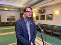 Labrador West MHA Jordan Brown speaks with reporters outside the House of Assembly on April 26. -Juanita Mercer/SaltWire Network file photo