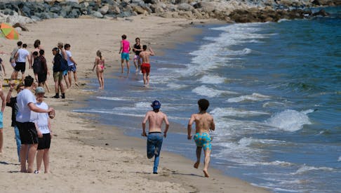 FOR NEWS STANDALONE:
Youths hit the sand at Queensland Beach Provincial Park on a summer-like afternoon Wednesday May 15, 2024.

TIM KROCHAK PHOTO