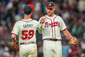 May 14, 2024; Cumberland, Georgia, USA; Atlanta Braves third baseman Zack Short (59) reacts with first baseman Matt Olson (28) after the Braves defeated the Chicago Cubs at Truist Park. Mandatory Credit: Dale Zanine-USA TODAY Sports