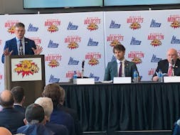 Gardiner MacDougall, left, speaks at a news conference at the Avenir Centre in Moncton, N.B., after being introduced as the head coach of the Quebec Maritimes Junior Hockey League’s Moncton Wildcats. MacDougall is from Bedeque, P.E.I. Also seated at the head table are newly-named general manager Taylor MacDougall, centre, who is Gardiner’s son, and Wildcats president Robert K. Irving. Jason Simmonds • The Guardian