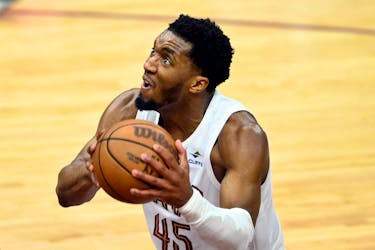 May 11, 2024; Cleveland, Ohio, USA; Cleveland Cavaliers guard Donovan Mitchell (45) controls the ball against the Boston Celtics in the third quarter of game three of the second round of the 2024 NBA playoffs at Rocket Mortgage FieldHouse. Mandatory Credit: David Richard-USA TODAY Sports