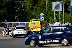 An ambulance believed to be carrying Slovak Prime Minister Robert Fico following a shooting incident drives on, in Handlova, Slovakia, May 15, 2024.