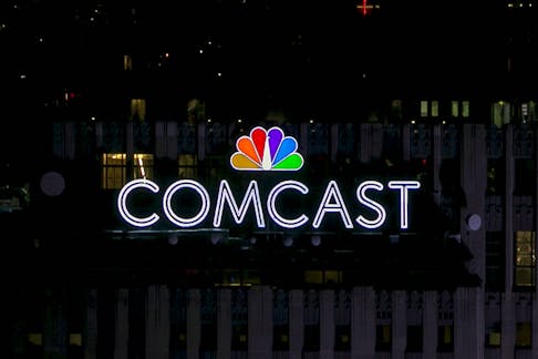 The NBC and Comcast logo are displayed on top of 30 Rockefeller Plaza, formerly known as the GE building, in midtown Manhattan in New York July 1, 2015.