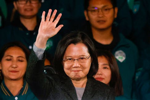 Taiwan's outgoing president Tsai Ing-wen waves during a rally, following the victory of Lai Ching-te in the presidential elections, in Taipei, Taiwan January 13, 2024.