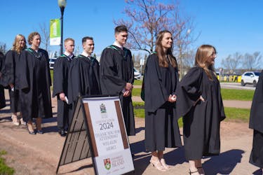 UPEI 2024 graduates from the faculty of nursing and the faculty of veterinary medicine walk into the Chi-Wan Young Sports Centre for their convocation ceremony on May 14. Vivian Ulinwa • The Guardian