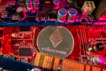 A representation of cryptocurrency Ethereum is placed on a PC motherboard in this illustration taken June 16, 2023.