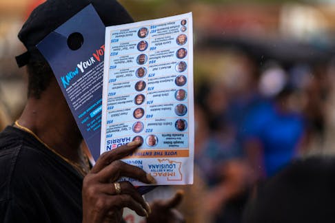 People line up to cast their ballot for the upcoming presidential election as early voting ends in New Orleans, Louisiana, U.S., October 27, 2020.