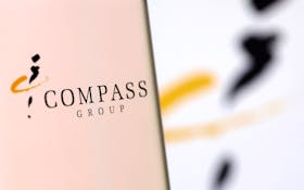 Compass Group's logo is pictured on a smartphone in this illustration taken, December 4, 2021.