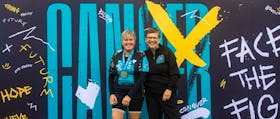 Susan Mullin (right), QEII Foundation president and CEO, celebrates with friend and BMO Ride participant Laurie Stephenson at the 2022 BMO Ride for Cancer event.