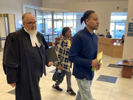 Tyreece Alexander Whynder-Ewing leaves Nova Scotia Supreme Court in Dartmouth with lawyer Chris Avery on May 7 during a recess at his second-degree murder trial. Whynder-Ewing, 30, pleaded guilty Wednesday to the lesser offence of manslaughter.