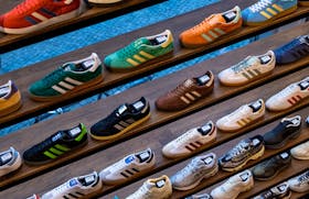 Adidas sneakers and other shoes for sale are pictured at a shop in Berlin, Germany, May 2, 2024.