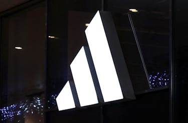 Logo of Adidas brand is displayed on the store in the center of Warsaw, Poland, January 4, 2024.