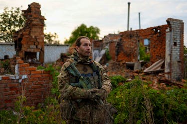 Deputy commander of the pro-Ukrainian Russian paramilitary group Freedom of Russia Legion Maksimilian Andronnikov with the call sign 'Caesar' speaks with Reuters after fighting with Russian troops near the border, amid Russia's attack on Ukraine, in Kharkiv region, Ukraine May 15, 2024.