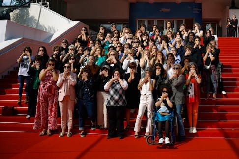 Judith Godreche, director of the short film "Moi Aussi" (Me Too), presented in the Official Selection 2024, and members of associations defending women who have suffered violence pose for a group photo, as part of the #MeToo movement in France, on the steps of the Festival Palace during the 77th Cannes Film Festival in Cannes, France, May 16, 2024.