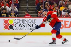 May 14, 2024; Sunrise, Florida, USA; Florida Panthers center Sam Reinhart (13) shoots the puck against the Boston Bruins during the second period in game five of the second round of the 2024 Stanley Cup Playoffs at Amerant Bank Arena. Mandatory Credit: Sam Navarro-USA TODAY Sports/File Photo
