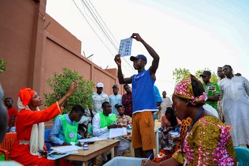 Poll workers count ballots at a polling station during a presidential election in N'Djamena, Chad May 6, 2024.