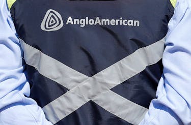 Logo of Anglo American is seen on a jacket of an employee of the Los Bronces copper mine, in the outskirts of Santiago, Chile March 14, 2019.
