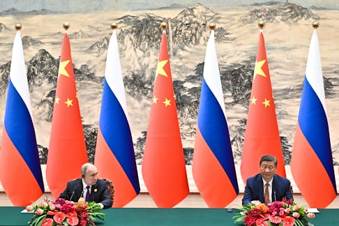 Russian President Vladimir Putin and Chinese President Xi Jinping attend a signing documents ceremony at the Great Hall of the People in Beijing, China May 16, 2024. Sputnik/Sergei Bobylev/Pool via REUTERS