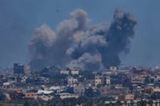 Smoke rises from an explosion following an Israeli airstrike in northern Gaza, near the Israel-Gaza border, amid the ongoing conflict between Israel and the Palestinian Islamist group Hamas, as seen from Israel, May 16, 2024.