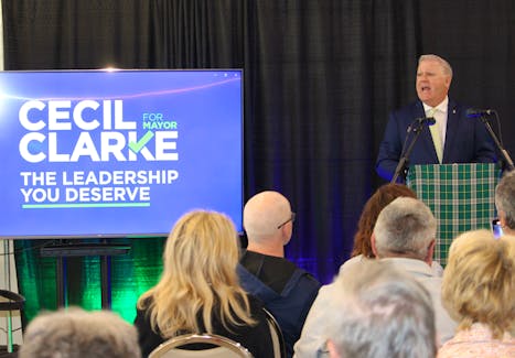 Former CBRM mayor Cecil Clarke announces his intentions to run for the mayor's seat in this fall's municipal election during a gathering of several hundred spectators Thursday at the Horizon Achievement Centre in Sydney. IAN NATHANSON/CAPE BRETON POST