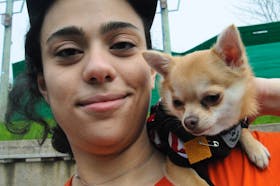 Hind Faiad of St. John’s and her dog, Potato, participated in the Moose Hide Campaign Day walk. Joe Gibbons • The Telegram