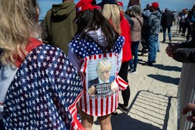 Supporters wait to attend a campaign rally for former U.S. president and Republican presidential candidate Donald Trump in Wildwood, New Jersey, U.S., May 11, 2024.