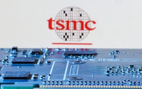 Taiwan Semiconductor Manufacturing Company (TSMC) logo is seen near computer motherboard in this illustration taken January 8, 2024.