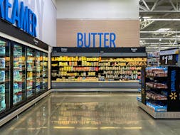 View of an aisle with new signage at Walmart's newly remodeled Supercenter, in Teterboro, New Jersey, U.S., June 7, 2023.