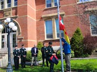 The flag of the 8th Canadian Hussars (Princess Louise’s) regiment and the Dutch village of Tynaarlo were raised outside Sussex Town Hall May 5 as part of a ceremony to commemorate the end of the Second World War in the Netherlands.