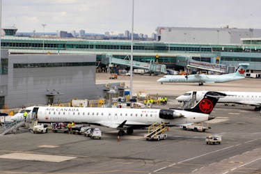 Air Canada planes are parked at Toronto Pearson International Airport in Mississauga, Ontario, Canada April 25, 2023. 