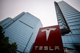 A Tesla logo is seen outside a showroom of the carmaker in Beijing, China May 31, 2023.
