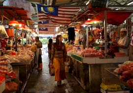 A woman shops in a wet market in Kuala Lumpur, Malaysia, February 18, 2016.