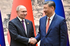 Russian President Vladimir Putin shakes hands with Chinese President Xi Jinping during a meeting in Beijing, China May 16, 2024. Sputnik/Sergei Bobylev/Pool via