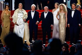 Director Paul Schrader, and cast members Uma Thurman, Penelope Mitchell and Richard Gere leave following the screening of the film "Oh Canada" in competition at the 77th Cannes Film Festival in Cannes, France, May 17, 2024.