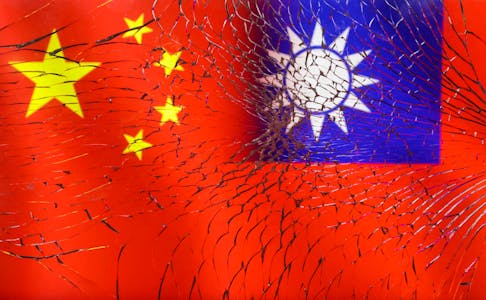 Chinese and Taiwanese flags are seen through broken glass in this illustration taken, April 11, 2023.