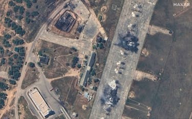 A satellite image of destroyed MiG31 fighter aircraft and fuel storage facility following an attack at Belbek Airbase, amid Russia's attack on Ukraine, in Crimea May 16, 2024.   Maxar Technologies/Handout via REUTERS