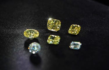 A view shows polished colorless and yellow diamonds produced at "Diamonds of ALROSA" factory in Moscow, Russia April 30, 2021. Picture taken April 30, 2021.