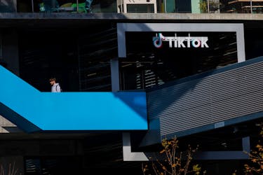 A person arrives at the offices of Tik Tok after the U.S. House of Representatives overwhelmingly passed a bill that would give TikTok's Chinese owner ByteDance about six months to divest the U.S. assets of the short-video app or face a ban, in Culver City, California, U.S., March 13, 2024. 