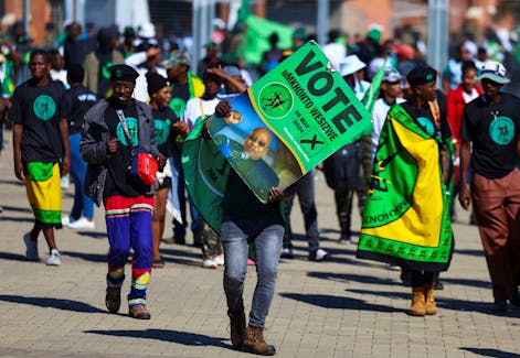 Supporters of former South African president Jacob Zuma's new political party, uMkhonto we Sizwe, arrive ahead of the launch of its election manifesto ahead of a general election on May 29, at a rally in Soweto, South Africa, May 18, 2024.