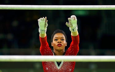 2016 Rio Olympics - Artistic Gymnastics - Final - Women's Uneven Bars Final - Rio Olympic Arena - Rio de Janeiro, Brazil - 14/08/2016. Gabrielle Douglas (USA) of USA (Gabby Douglas) competes.  
