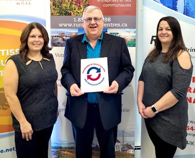 Josée Arsenault, left, client information officer at the Wellington Rural Action Centre, Raymond J. Arsenault, manager of the Acadian and Francophone Chamber of Commerce and RDÉE PEI’s communications officer, and Amy Richard, administrative financial assistant from RDÉE PEI.