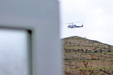 A helicopter carrying Iran's President Ebrahim Raisi takes off, near the Iran-Azerbaijan border, May 19, 2024. The helicopter with Raisi on board later crashed. Ali Hamed Haghdoust/IRNA/WANA (West Asia News Agency) via REUTERS