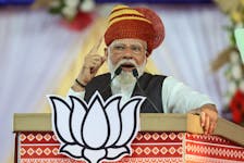 India's Prime Minister Narendra Modi addresses party supporters during an election campaign rally in Himmatnagar, India, May 1, 2024.